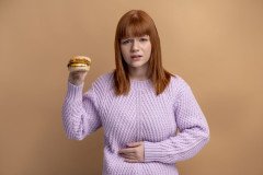 woman-with-eating-disorder-having-belly-pain