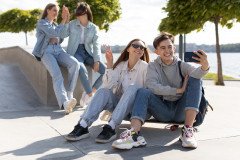 best-friends-taking-selfie-together-outdoors